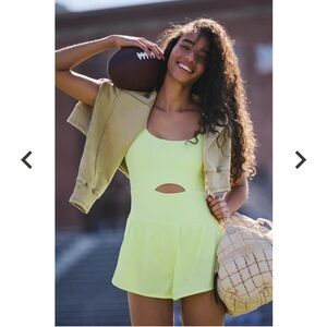 Yellow athletic romper/one piece